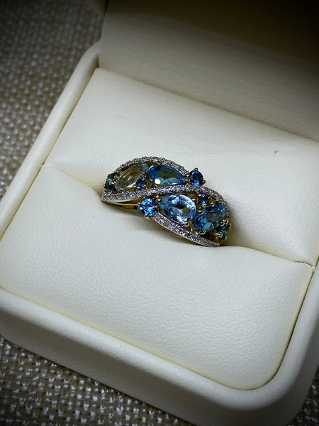 10K Yellow Gold Multi-Blue Topaz .15tw Diamond Ring