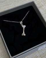 Sterling Silver Rhodium Plated CZ Dog Bone Necklace