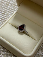 10K White Gold Garnet .14tw Diamond Pear Halo Ring