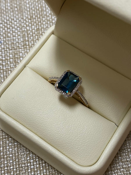 14K Yellow Gold London Blue Topaz .10tw Diamond Ring